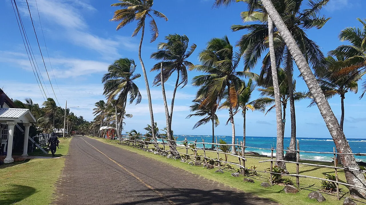 Sunny coast road beside Sally Peachie beach on Big Corn Island